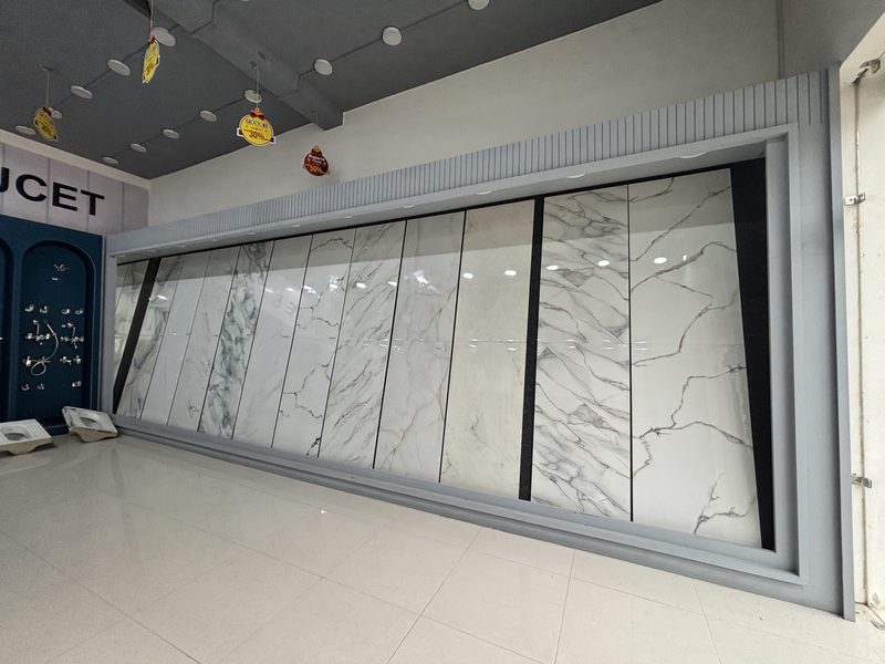 Large-format marble-look floor tiles at the Balaji Mart tiles showroom, Bikapur