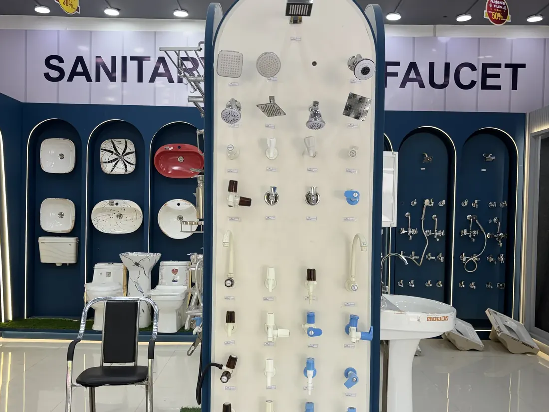 CP fittings and shower heads arranged in the bath fittings section at the Balaji Mart showroom, Bikapur