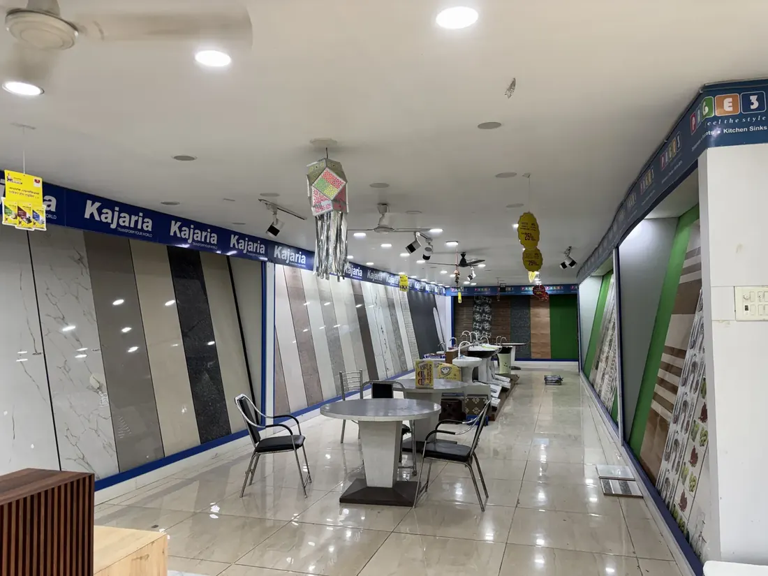 Floor and wall tiles arranged along the tile display gallery at the Balaji Mart showroom in Bikapur, Ayodhya